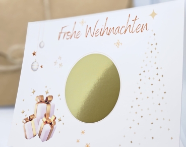 Detailansicht der Weihnachts-Rubbelkarte mit glänzendem Design und goldenem Feld.